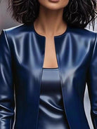 NEWYORKLISTED STYLE COLLECTION: Blue leather jacket worn by a person with a neutral background