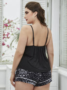 NEWYORKLISTED Intimate Apparel: Woman wearing a black top and leopard print shorts in a bright room.