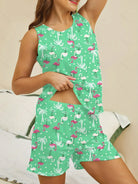 NEWYORKLISTED Intimate Apparel: Child wearing a green flamingo patterned outfit on a neutral background