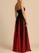 NEWYORKLISTED STYLE COLLECTION: Black and red dress with a high slit on a beige background