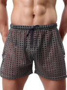 NEWYORKLISTED ATLAS MEN'S COLLECTION: Gray mesh shorts worn by a person on a white background