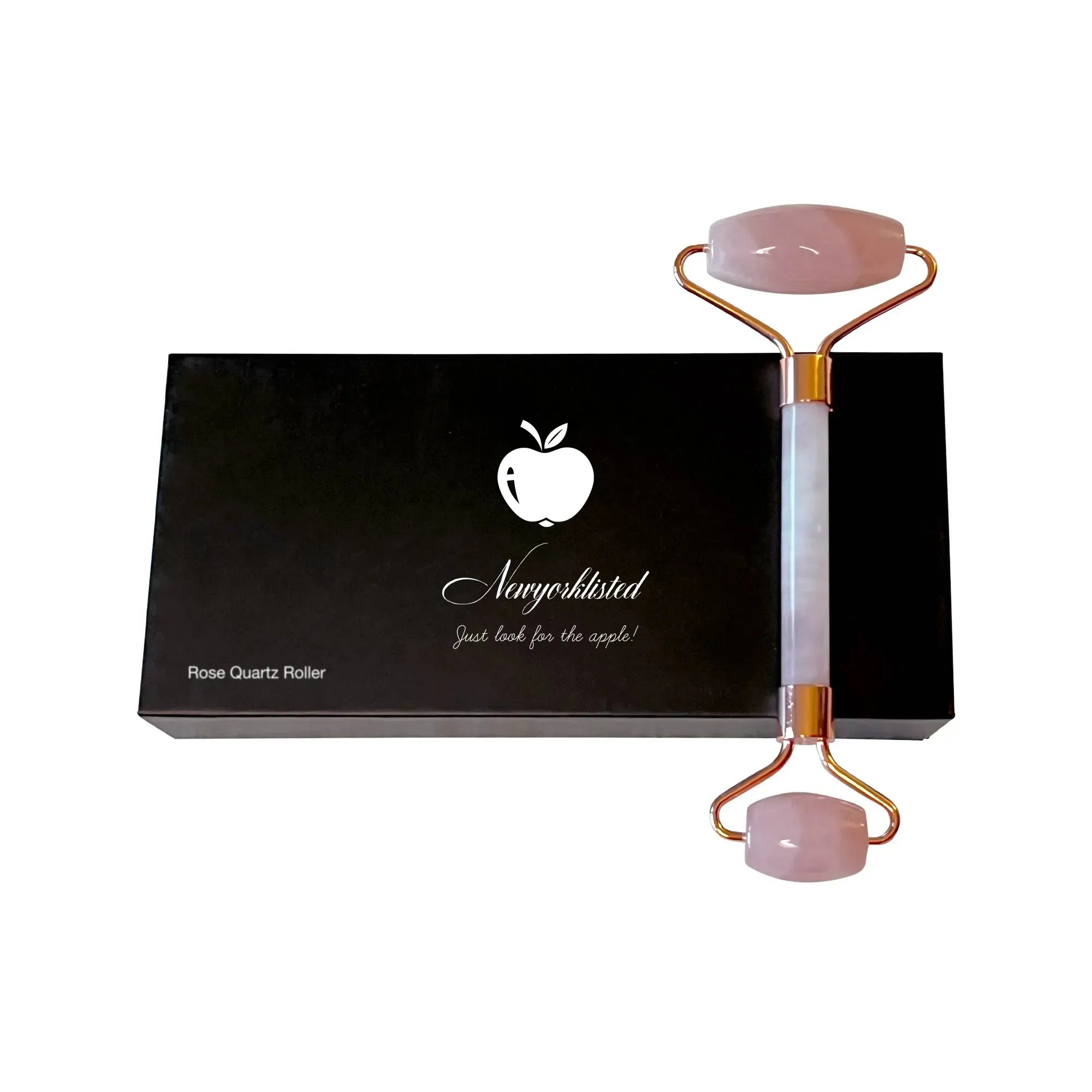 NEWYORKLISTED Cosmetic Collection: Rose Quartz Roller with gold accents on a black box featuring the NEWYORKLISTED white apple logo.