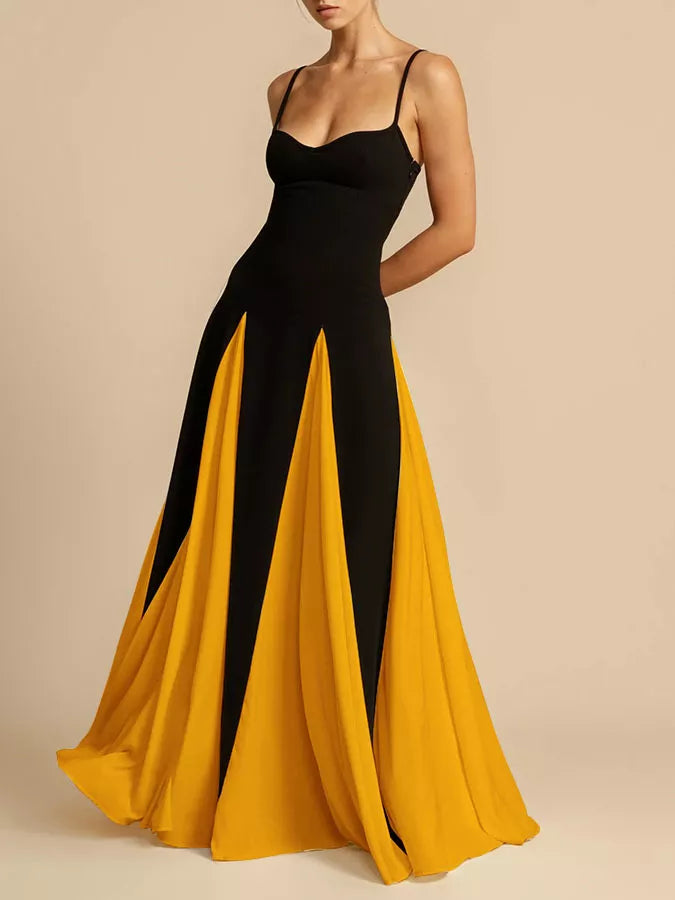 NEWYORKLISTED STYLE COLLECTION: Black and yellow evening gown on a beige background