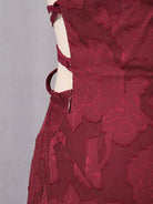 NEWYORKLISTED STYLE COLLECTION: Red lace dress on a mannequin against a gray background