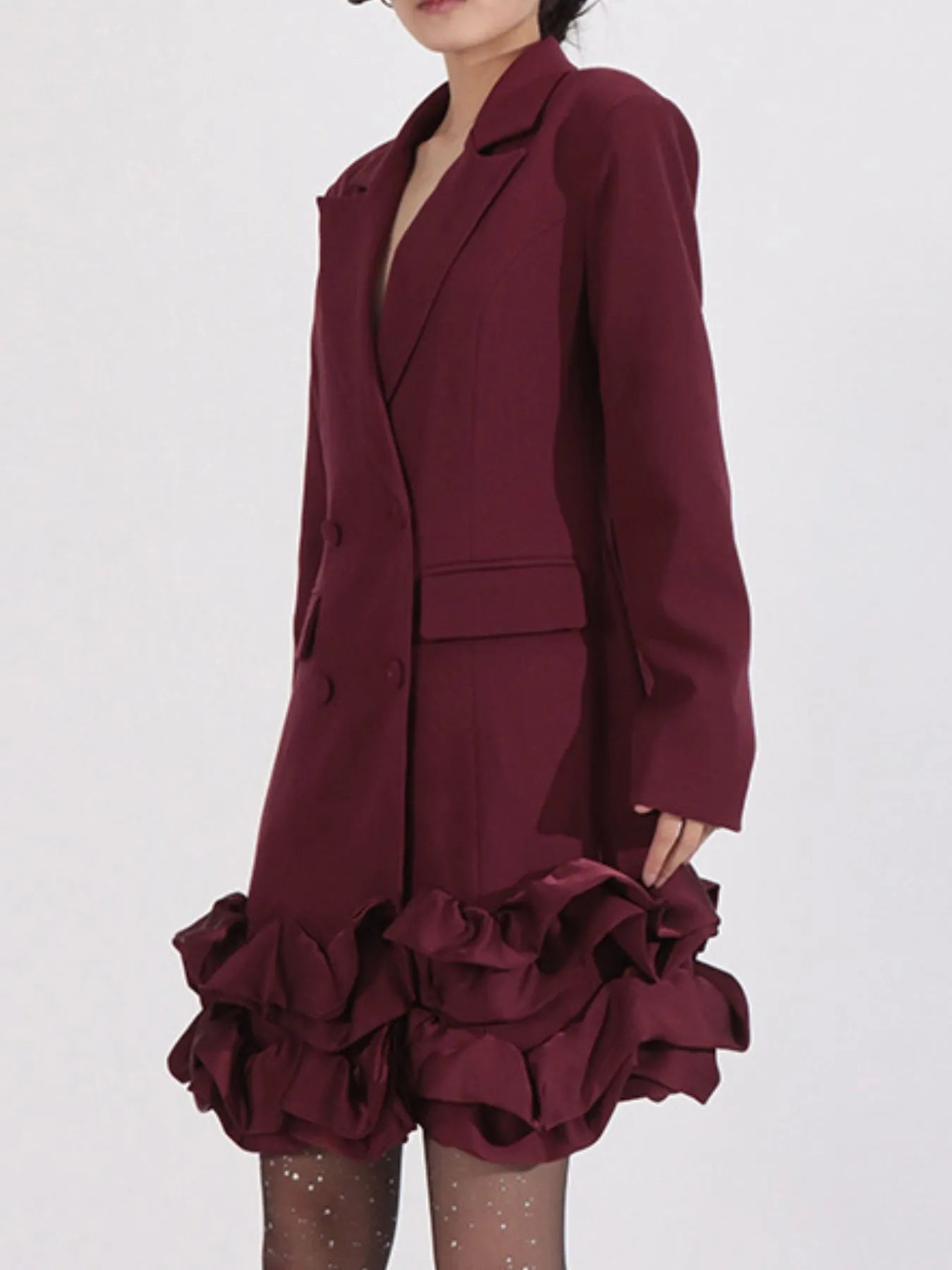 NEWYORKLISTED Runway Style: Maroon blazer and ruffled skirt set on a white background