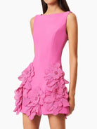 NEWYORKLISTED STYLE COLLECTION: Pink dress with floral details on a white background