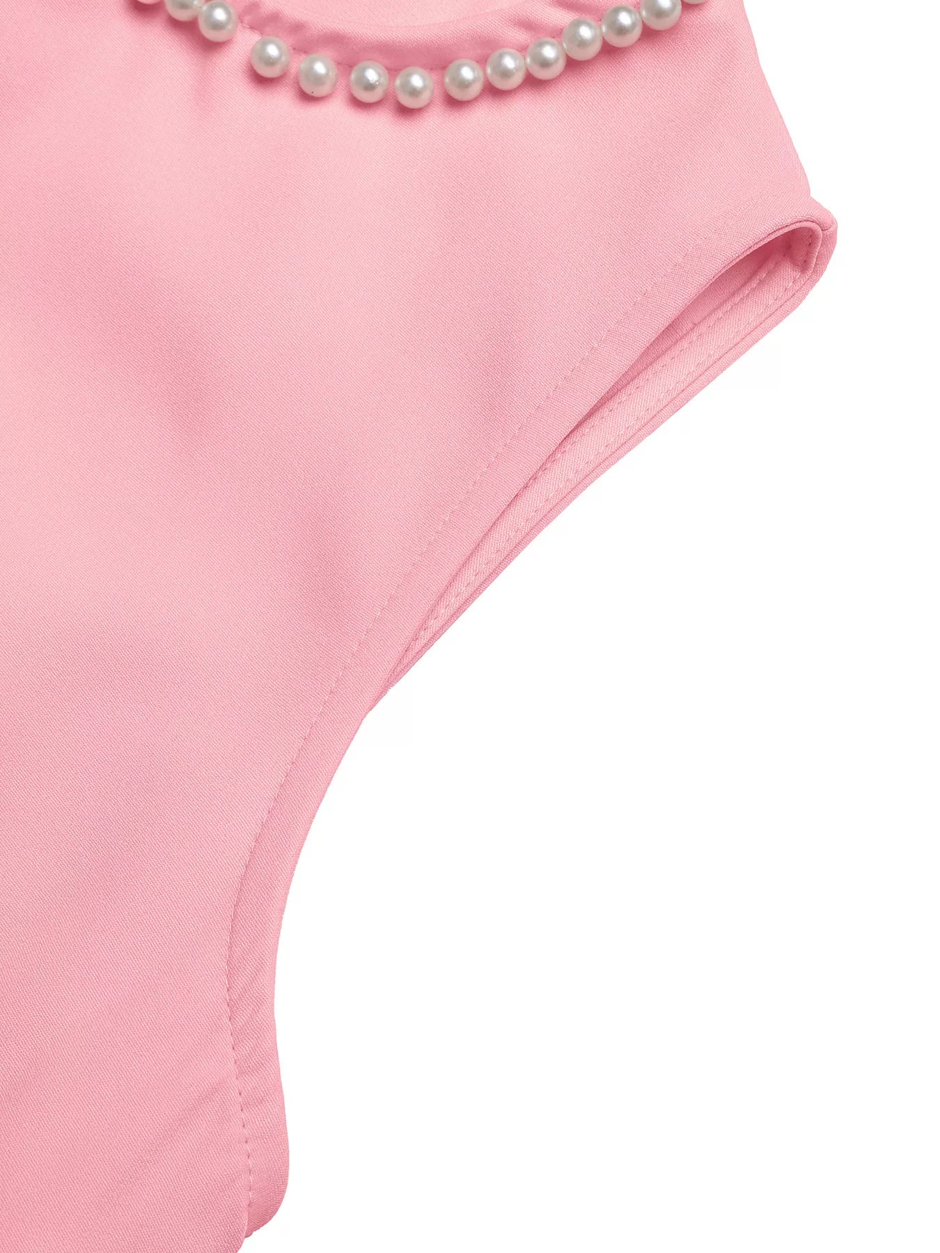 NEWYORKLISTED STYLE COLLECTION: Pink swimsuit with pearl details on a white background
