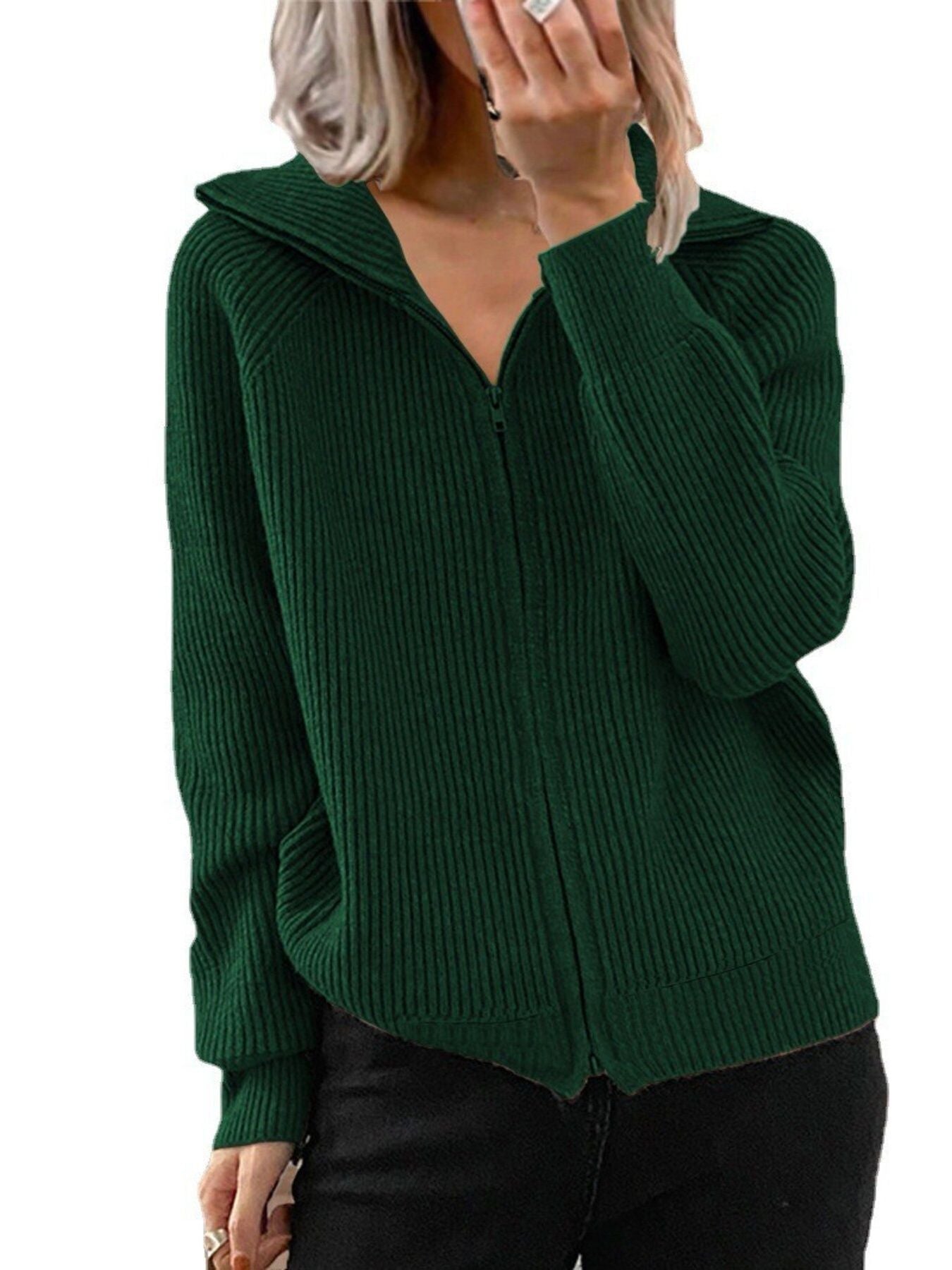 NEWYORKLISTED STYLE COLLECTION: Green ribbed sweater worn by a person on a white background