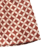 NEWYORKLISTED STYLE COLLECTION: Fabric with a geometric pattern on a white background