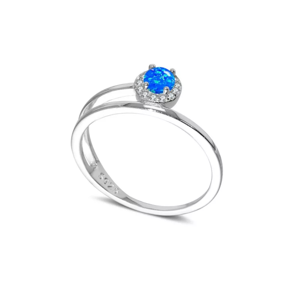 NYLD Glamour Collection by NEWYORKLISTED: Silver ring with a blue gemstone on a white background