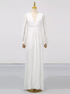 NEWYORKLISTED STYLE COLLECTION: White long-sleeve dress on a mannequin against a white background