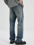 NEWYORKLISTED ATLAS MEN's COLLECTION: Person wearing blue jeans and a checkered shirt on a white background