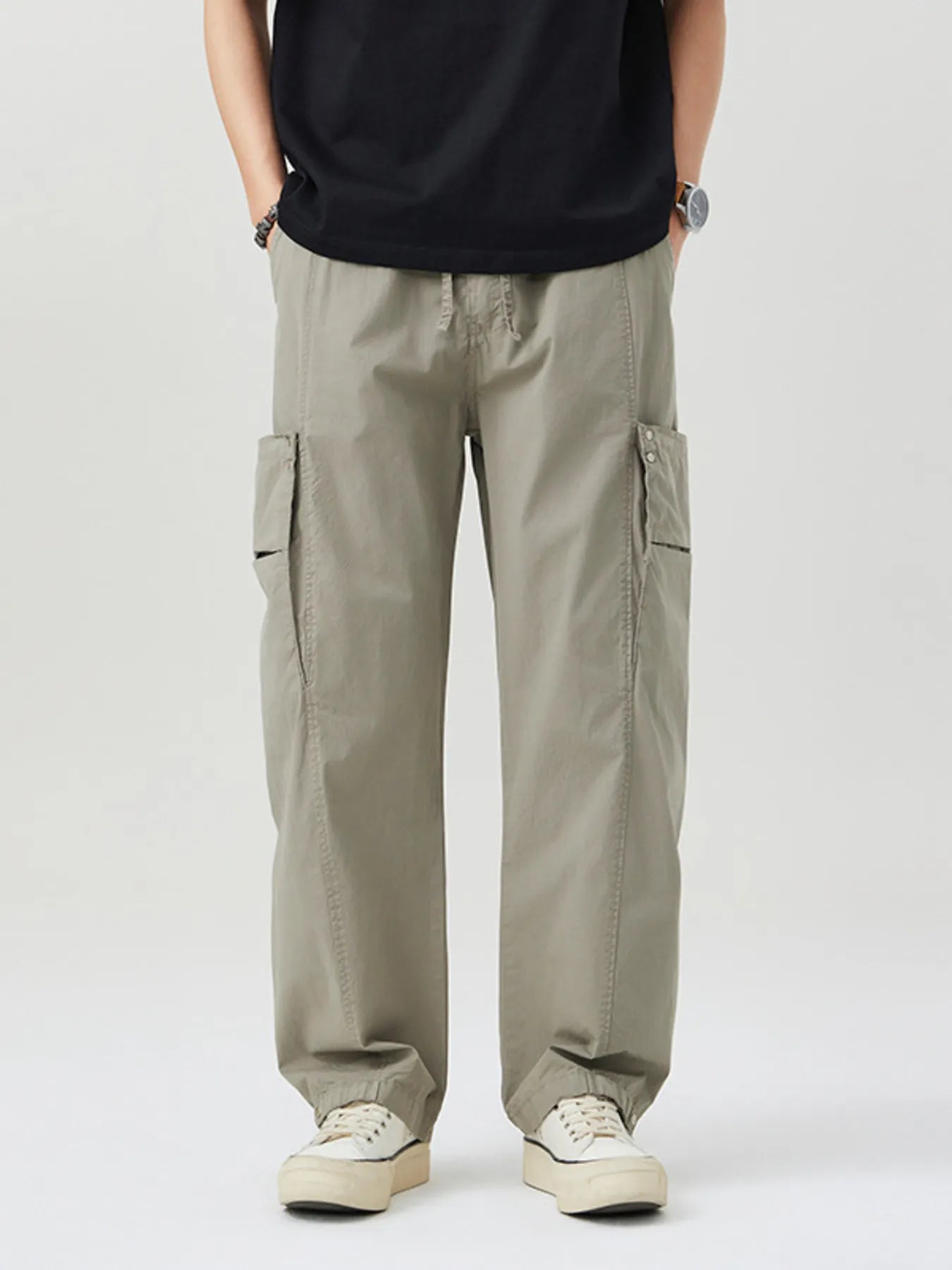 NEWYORKLISTED ATLAS MEN's COLLECTION: Person wearing beige cargo pants on a white background