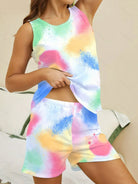NEWYORKLISTED Intimate Apparel: Colorful tie-dye sleeveless top and shorts set on a person.