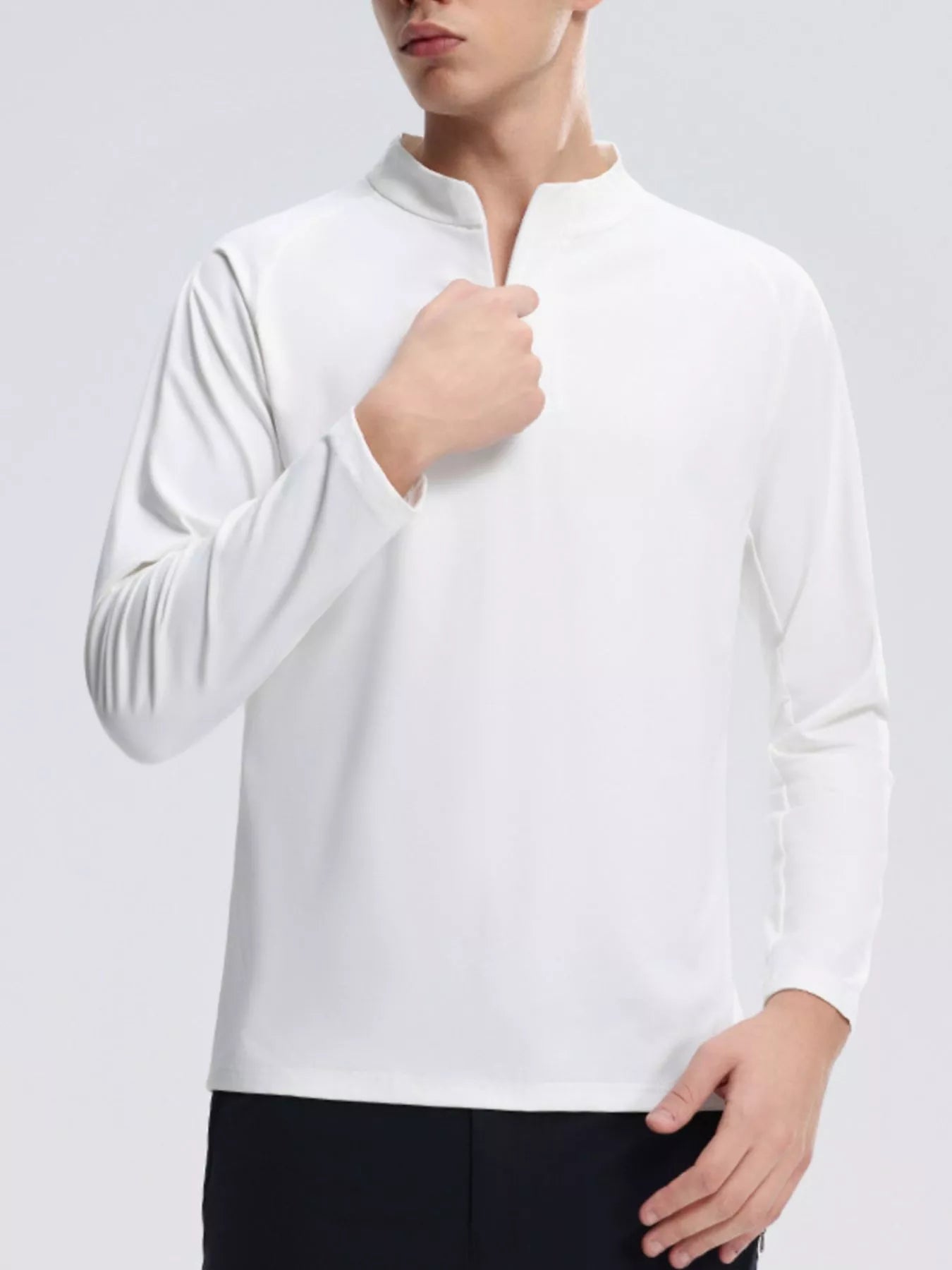 NEWYORKLISTED ATLAS MEN's COLLECTION: Person wearing a white long-sleeve shirt on a light gray background