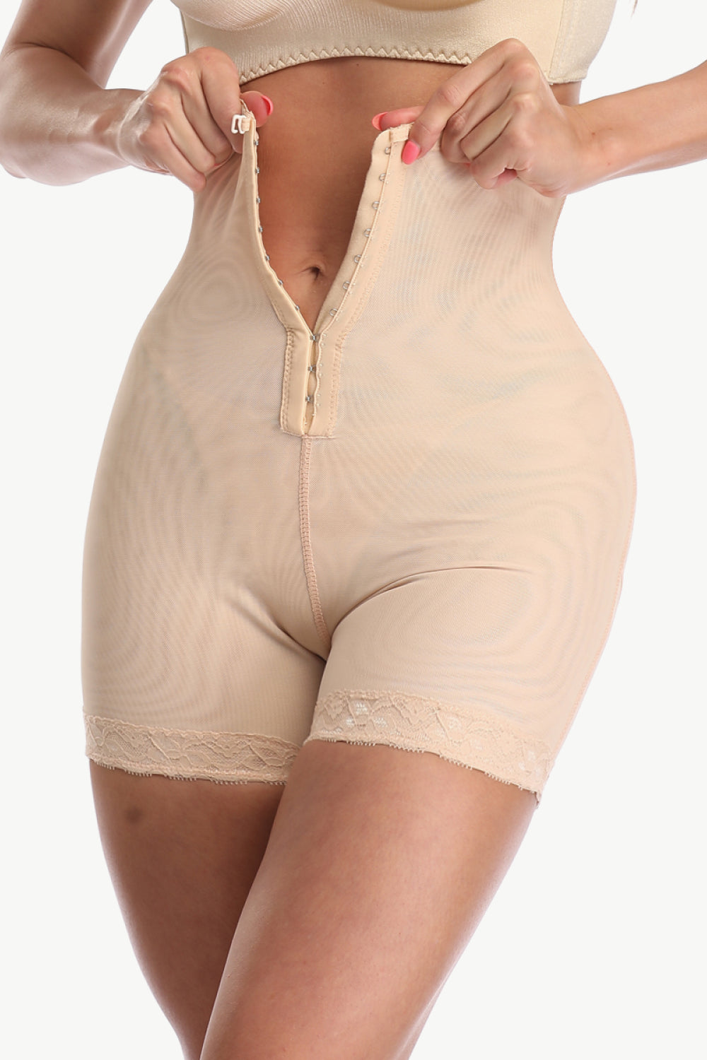 NEWYORKLISTED Intimate Apparel: Beige shapewear with a zipper on a white background