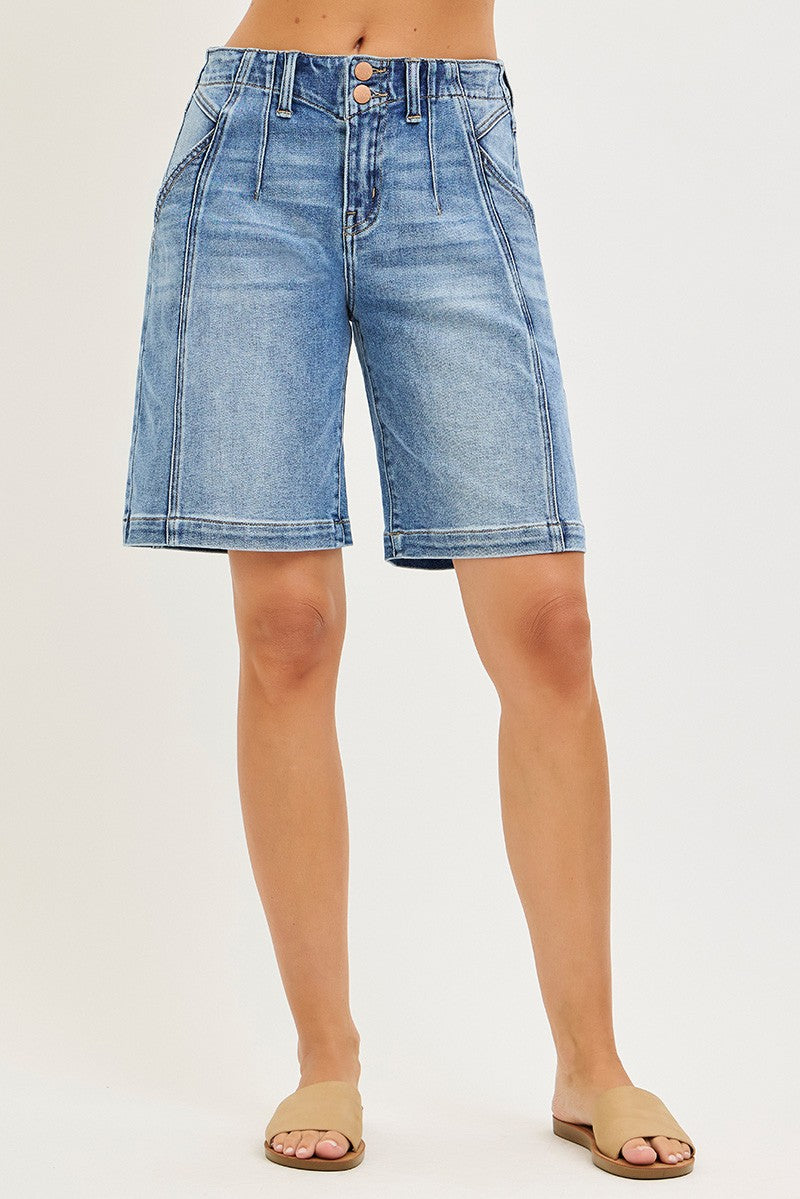 NEWYORKLISTED STYLE COLLECTION: Blue denim shorts worn by a person on a white background