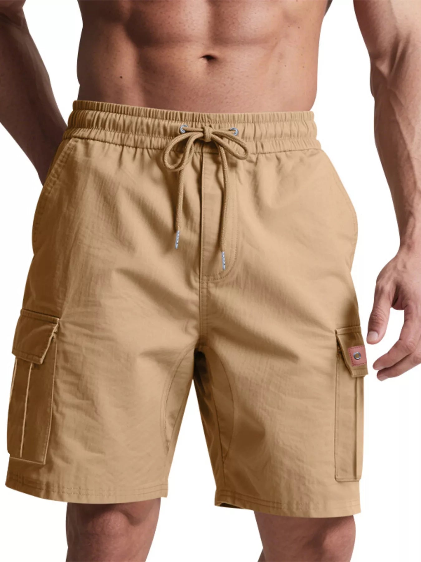 NEWYORKLISTED ATLAS MEN'S COLLECTION: Beige cargo shorts worn by a person on a white background