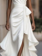 NEWYORKLISTED STYLE COLLECTION: White dress with a bow detail on a blurred background