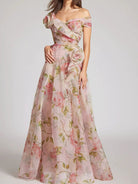 NEWYORKLISTED STYLE COLLECTION: Floral off-shoulder dress on a plain background