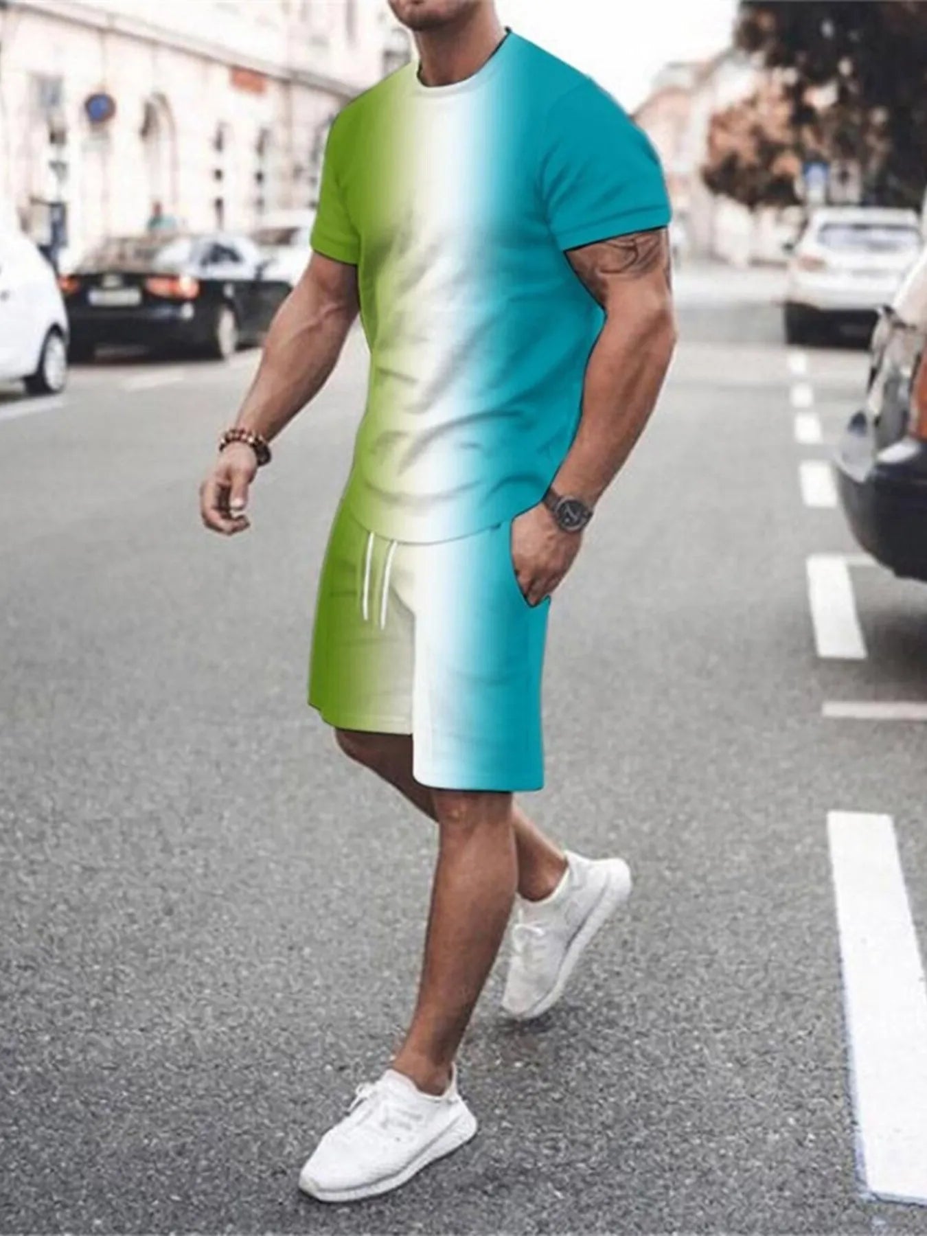 NEWYORKLISTED ATLAS MEN's COLLECTION: Person wearing a green and blue gradient dress on a city street.