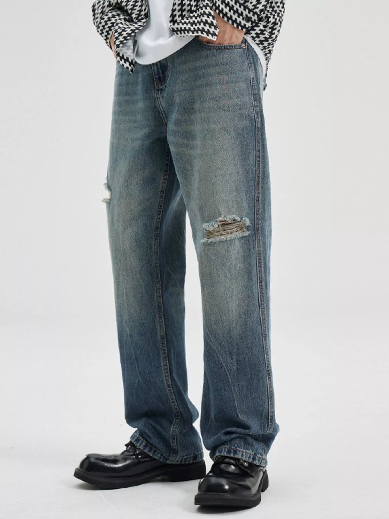 NEWYORKLISTED ATLAS MEN's COLLECTION: Person wearing blue jeans with a slight distressed look on a white background