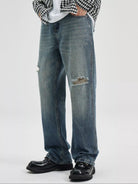 NEWYORKLISTED ATLAS MEN's COLLECTION: Person wearing blue jeans with a slight distressed look on a white background