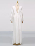 NEWYORKLISTED STYLE COLLECTION: White dress on a mannequin against a white background