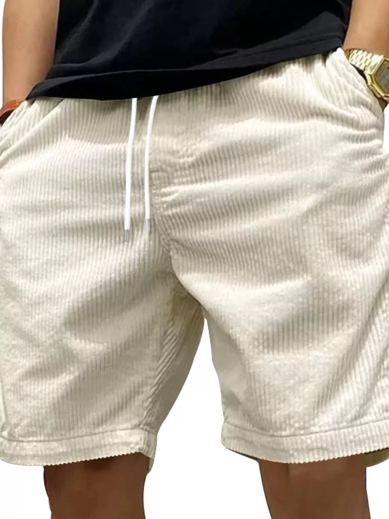 NEWYORKLISTED ATLAS MEN'S COLLECTION: White corduroy shorts worn by a person on a white background