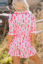 NEWYORKLISTED Intimate Apparel: Person wearing a dress with red boot pattern in a natural setting