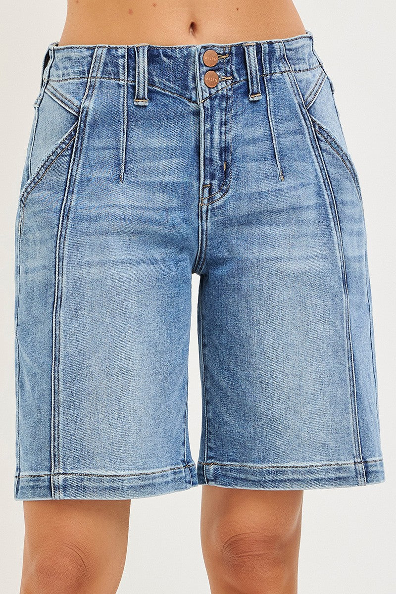 NEWYORKLISTED STYLE COLLECTION: Blue denim shorts worn by a person on a white background