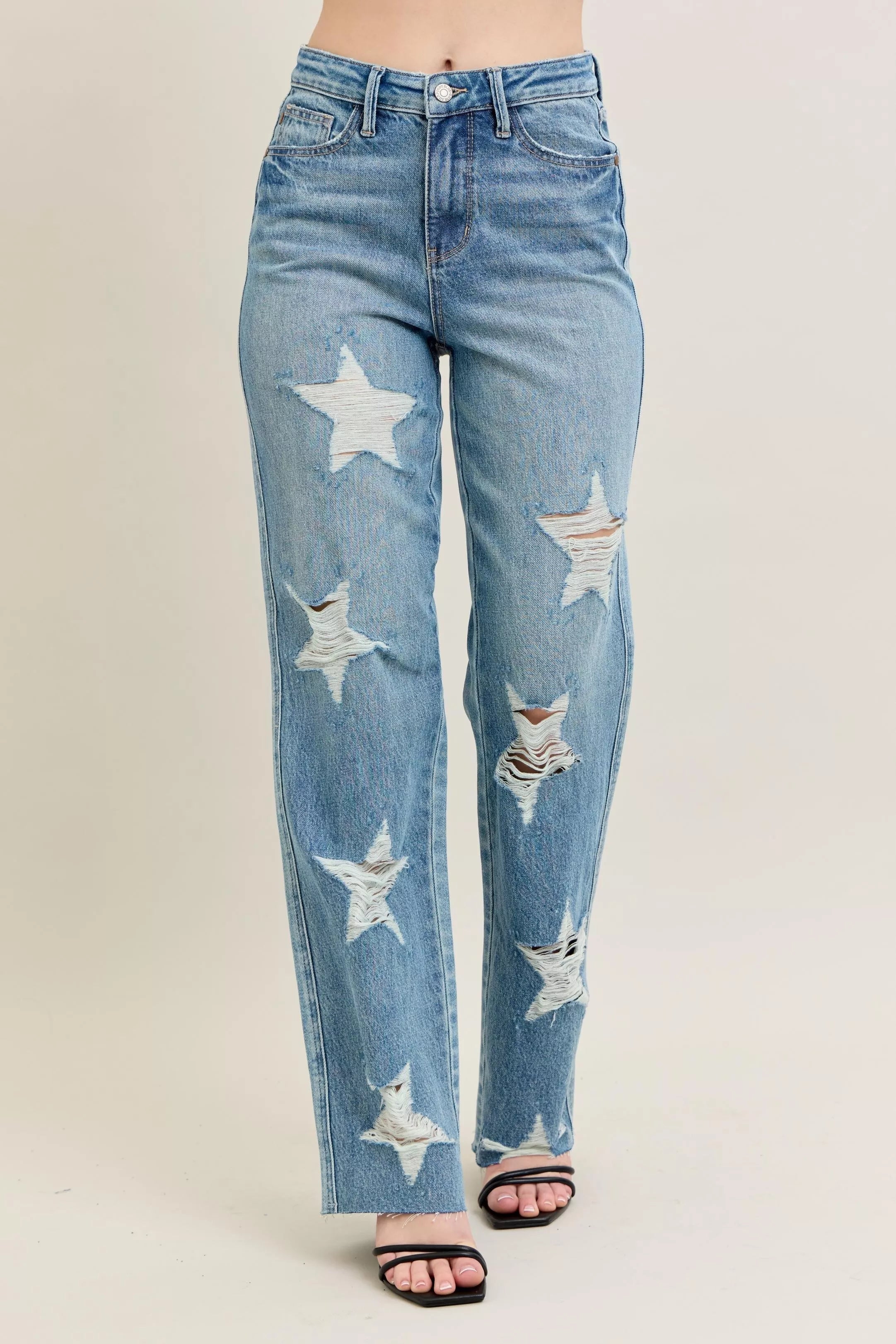 NEWYORKLISTED STYLE COLLECTION: Blue jeans with star patterns on a beige background