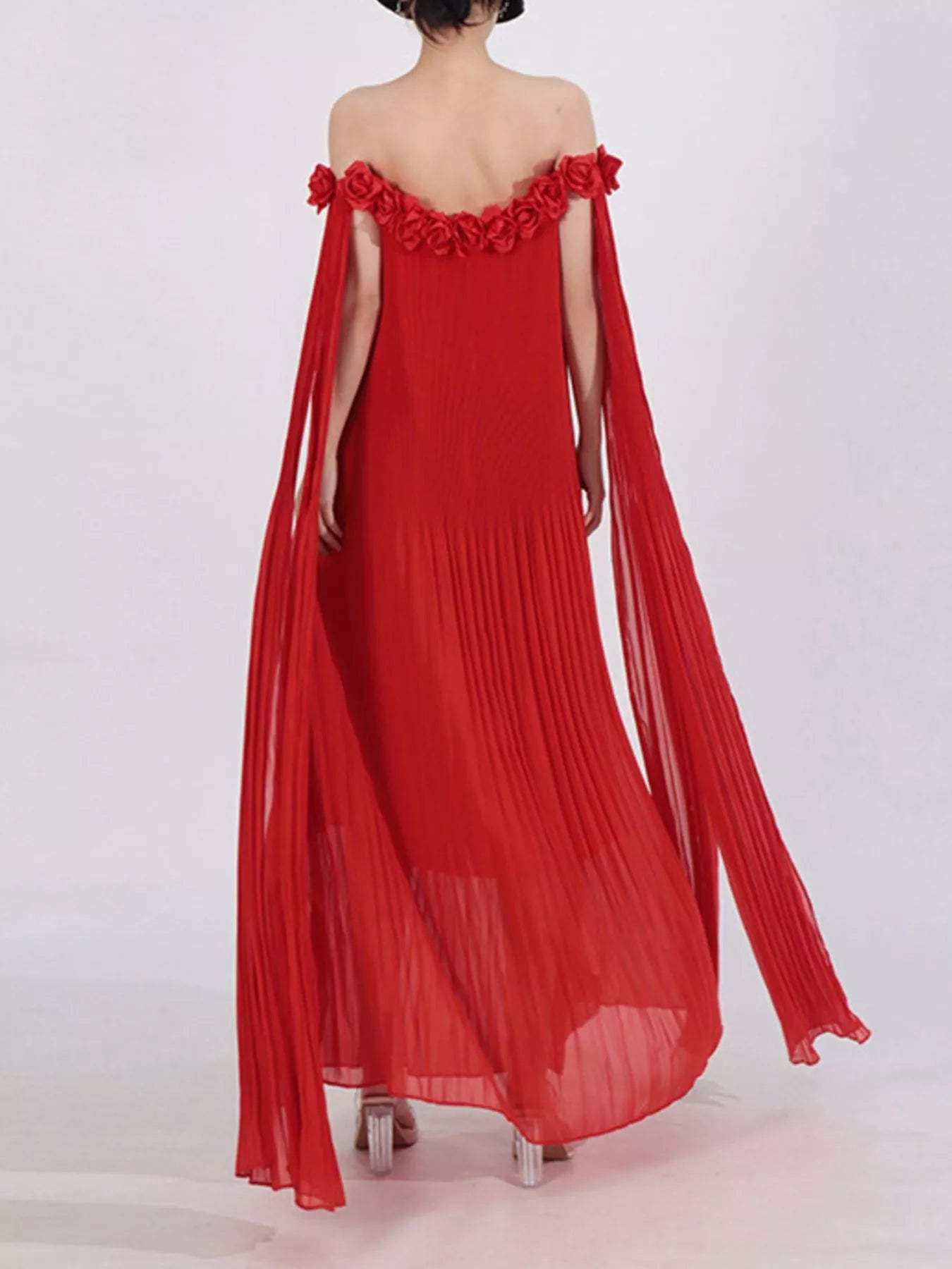 NEWYORKLISTED STYLE COLLECTION: Red off-shoulder dress with floral details on a white background