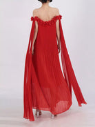 NEWYORKLISTED STYLE COLLECTION: Red off-shoulder dress with floral details on a white background