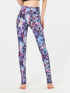 NEWYORKLISTED ACTIVEWEAR COLLECTION: Multicolored floral leggings worn by a person on a white background
