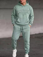 NEWYORKLISTED ATLAS MEN'S COLLECTION: Men's kangaroo-pocket hoodie and pants set, model view