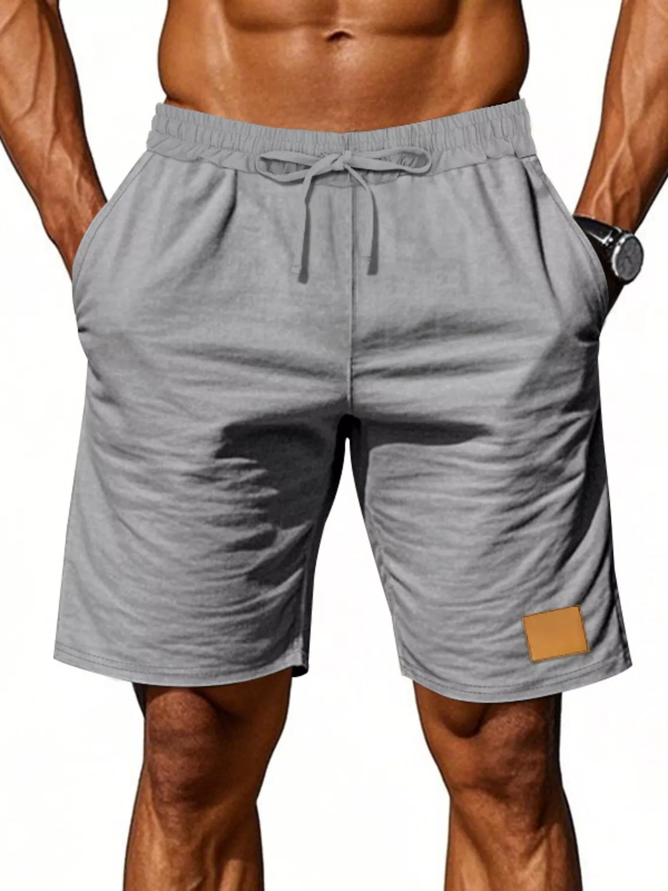 NEWYORKLISTED ATLAS MEN'S COLLECTION: Gray shorts with a drawstring on a white background