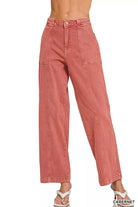 NEWYORKLISTED Style Collection: Pink jeans worn by a person on a white background