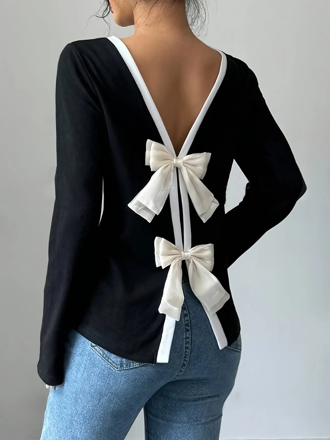 NEWYORKLISTED STYLE COLLECTION: Long Sleeve Bow Tie Back T-Shirt