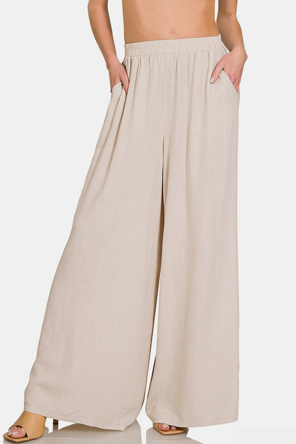 NEWYORKLISTED Model is wearing Beige Wide Leg Pants