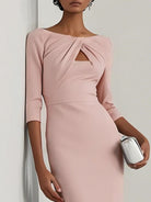 NEWYORKLISTED STYLE COLLECTION: Pink dress with a cut-out design on a plain background