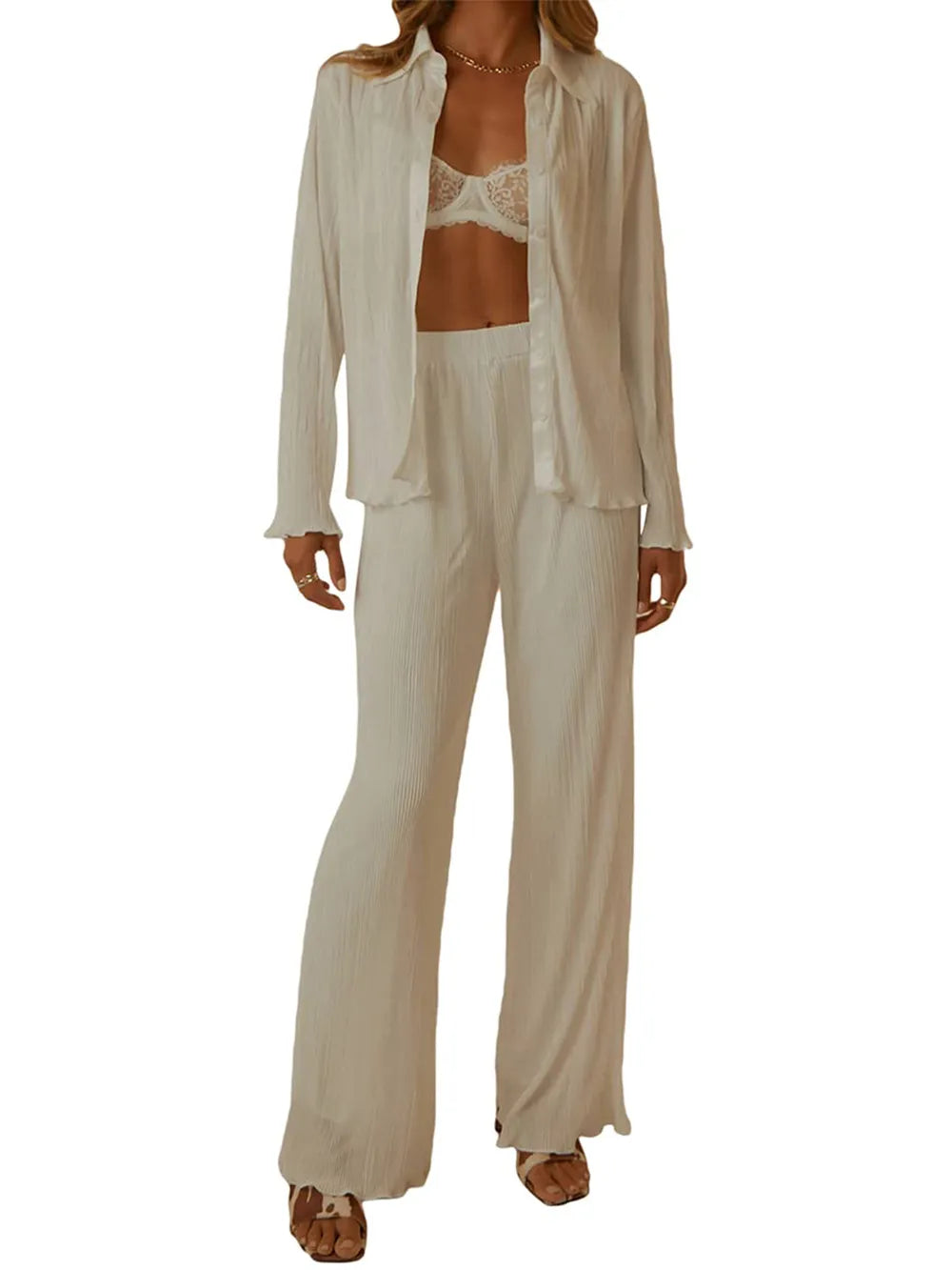 NEWYORKLISTED Intimate Apparel Collection: Beige pajama set with matching top and pants on a white background