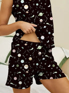 NEWYORKLISTED Intimate Apparel: Person wearing a black sleeveless top and shorts with space-themed pattern on a neutral background