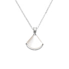NYLD Glamour By NEWYORKLISTED: Silver necklace with a teardrop-shaped pendant on a white background
