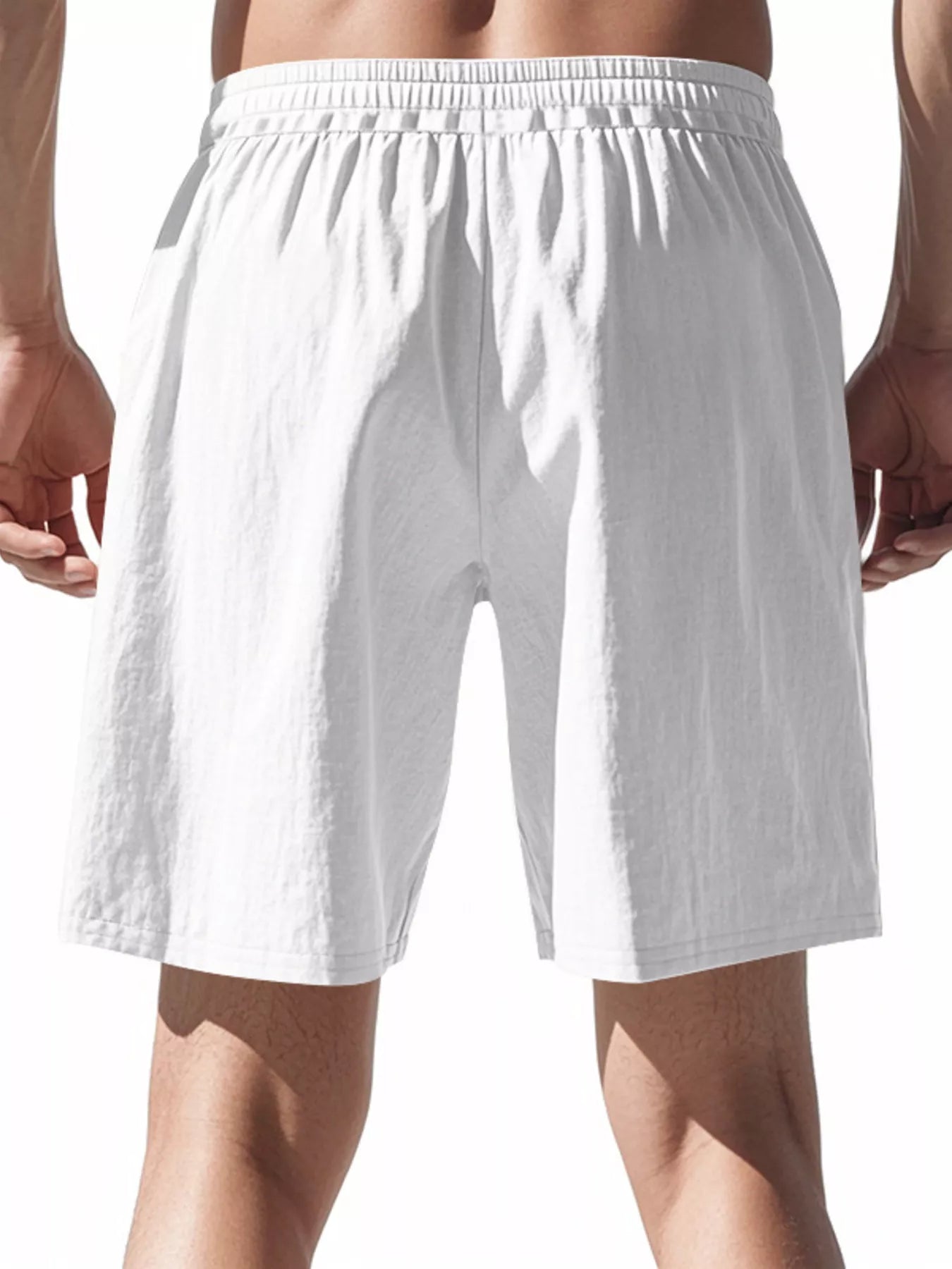 NEWYORKLISTED ATLAS MEN'S COLLECTION: White shorts worn by a person on a white background