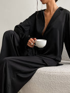 NEWYORKLISTED Intimate Apparel Collection: model wearing black lounge wear set 
