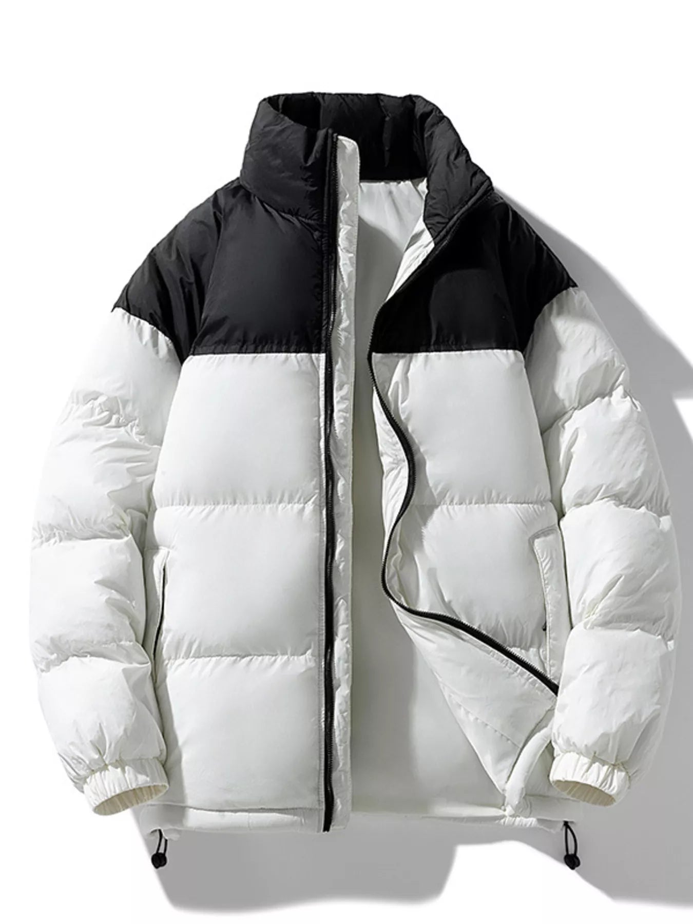 NEWYORKLISTED ATLAS MEN’S COLLECTION: White puffer jacket with black accents on a white background