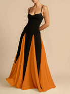 NEWYORKLISTED STYLE COLLECTION: Black and orange evening gown on a beige background