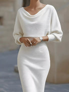 NEWYORKLISTED STYLE COLLECTION: White knit dress worn by a person with a blurred background