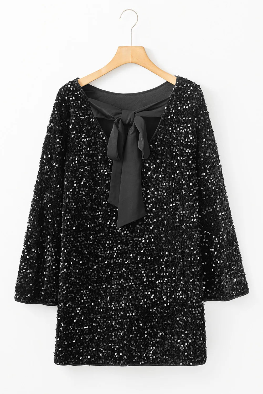 NEWYORKLISTED Valentine's Day Specials: Black sequin dress with a black bow tie on a hanger against a white background